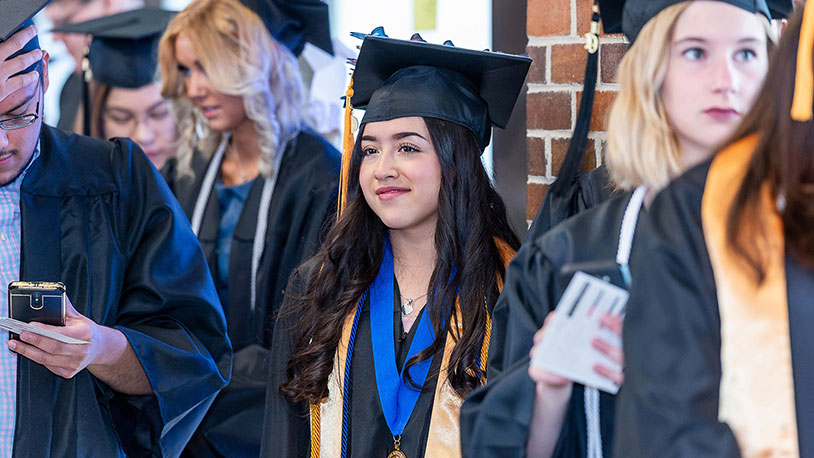 Students in graduation caps and gowns