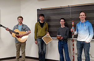 Music students with their hand-made instruments
