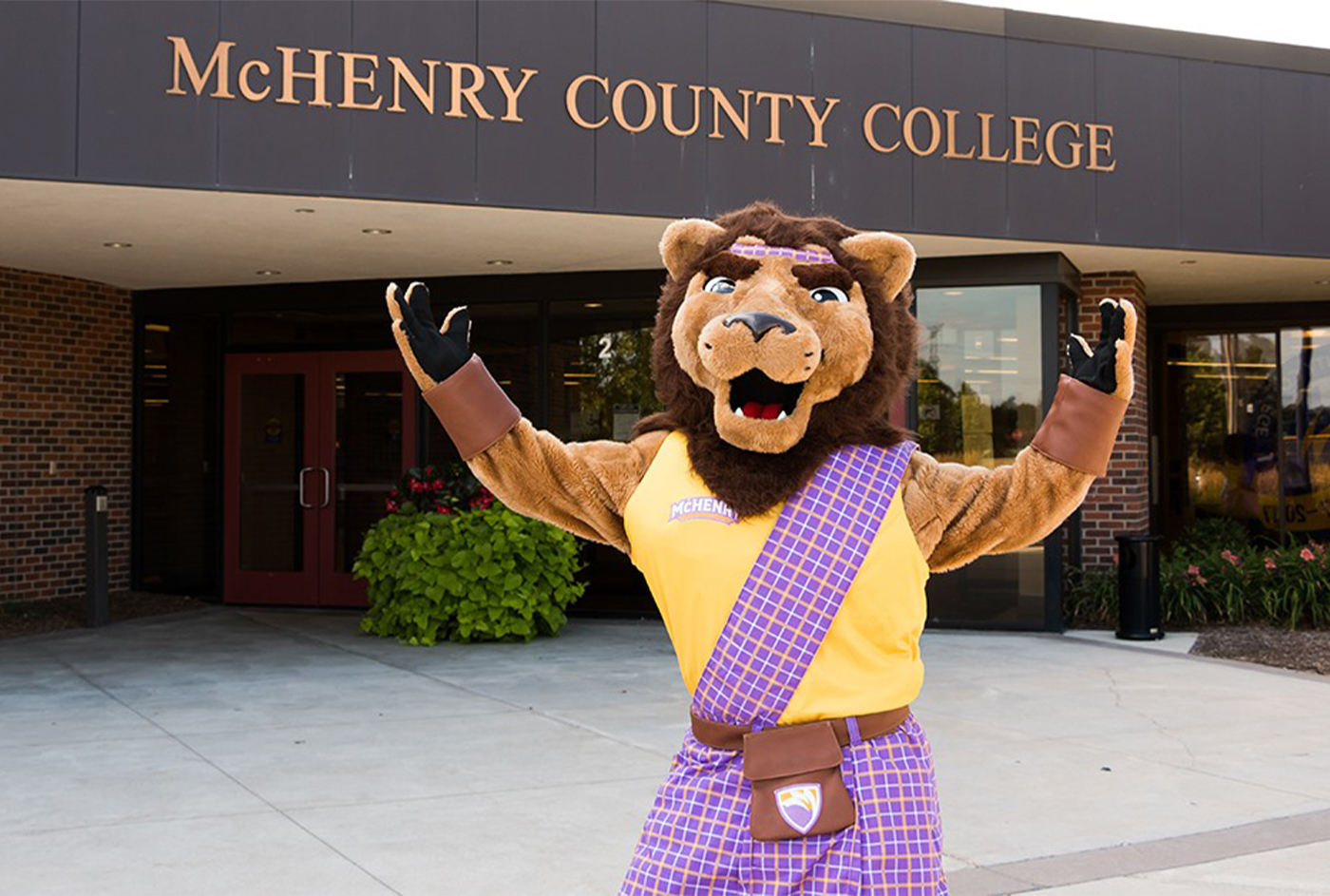 roary stands in front of entrance B at MCC