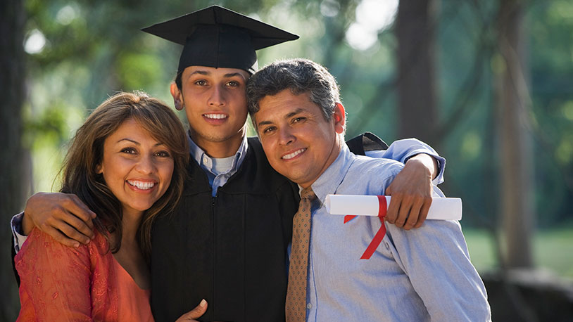 photo of mom and dad with their college grad