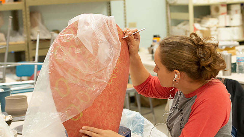 MCC student sculpting in ceramics lab