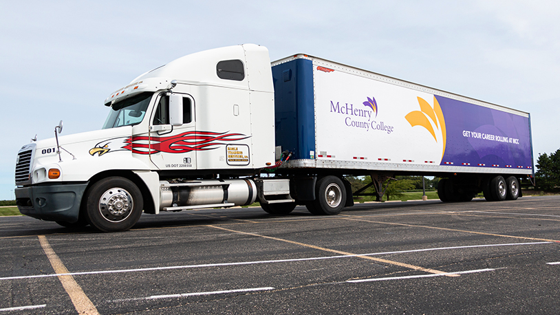 photo of CDL Semi Tractor Trailer with MCC logo