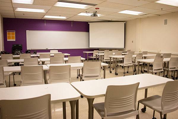 photo of large Conference Center with projectors