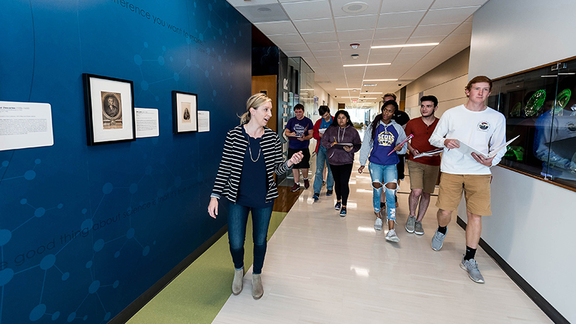 Kate Kramer walking with students 