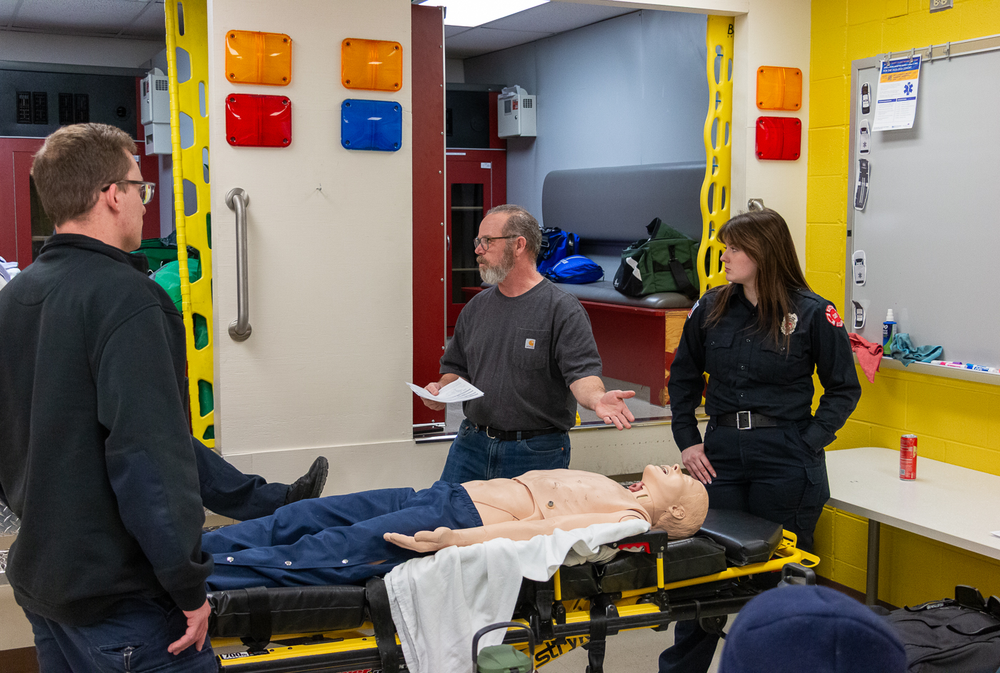 a student in MCC's Paramedic program stands in 