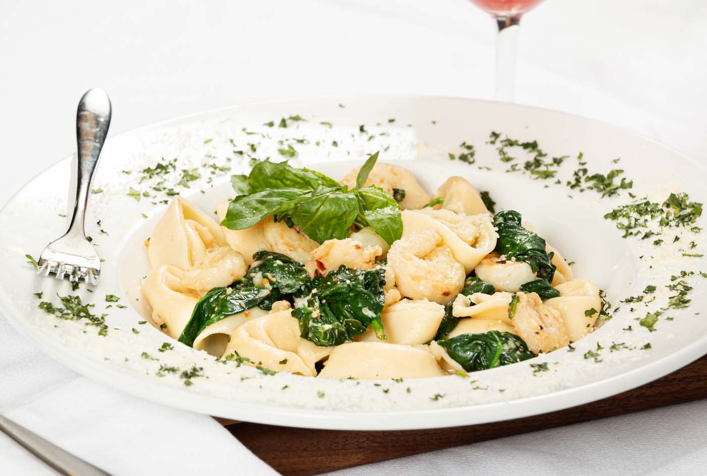 plate of pasta with greens