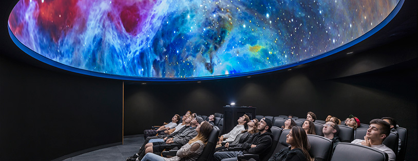 students in the planetarium