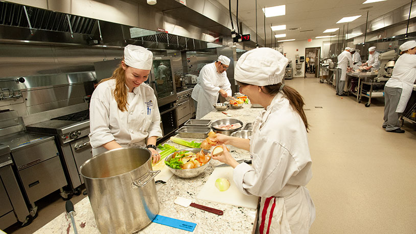MCC culinary students in the kitchen lab