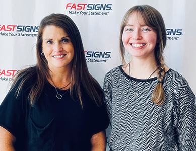 Fast Signs owner Jody Kemp and MCC student intern Allison Stroyan