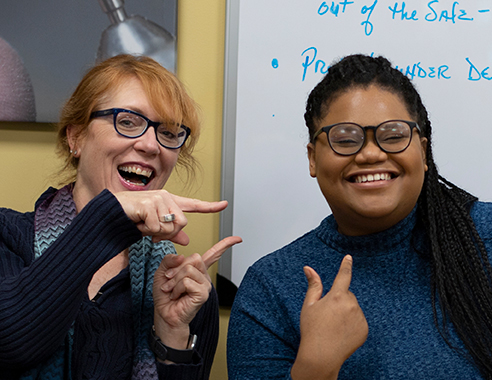 MCC student Genesis Encarnacion and Dougherty Enterprises’ director of marketing, Jennifer Meyers 